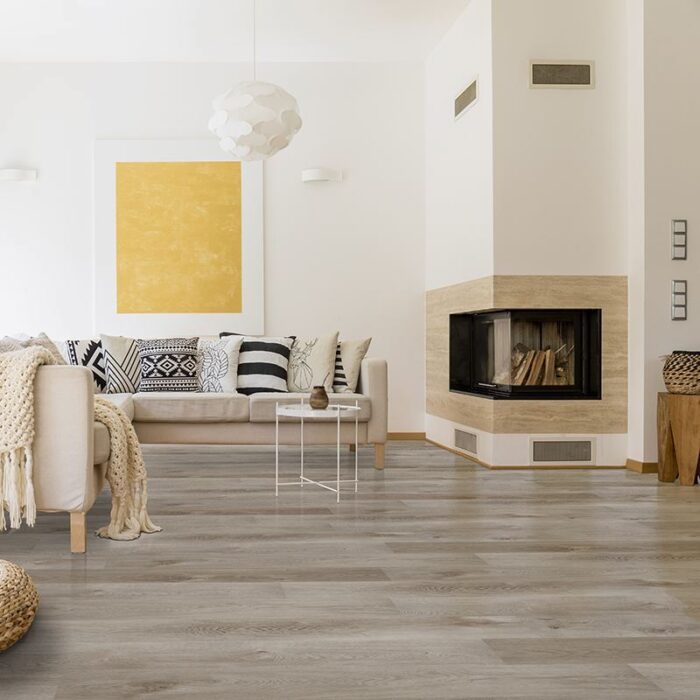 A living room with Whitfield Gray Vinyl Flooring